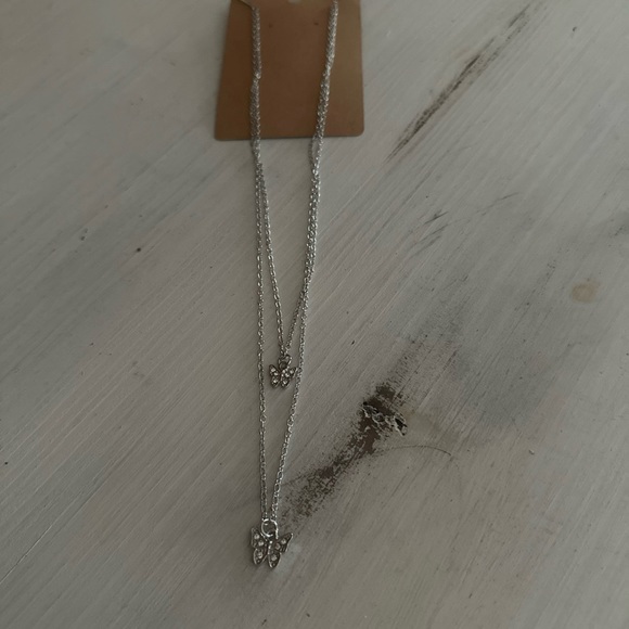 NWT Silvertone multi chain butterfly necklace - Picture 6 of 6